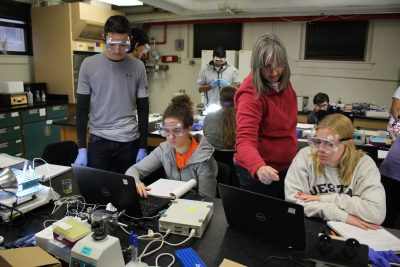 dr kathy ryan mentors students in lab