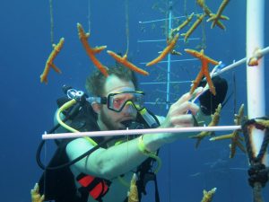 student with coral