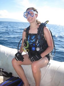 amy tan in scuba gear on boat