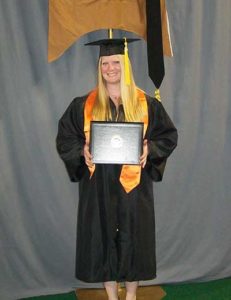 photo of katrina hofstetter with diploma
