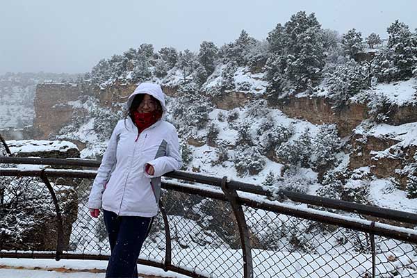 Photo of Zhaolan Ding outside in the snow