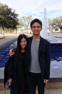 two people in front of fountain