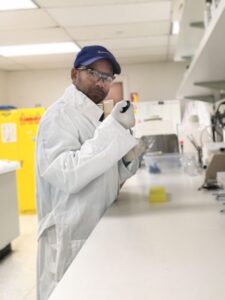 sachi mandal holding pipette