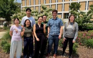 members of bard lab posing outside