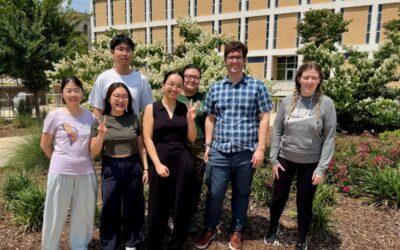 members of bard lab posing outside